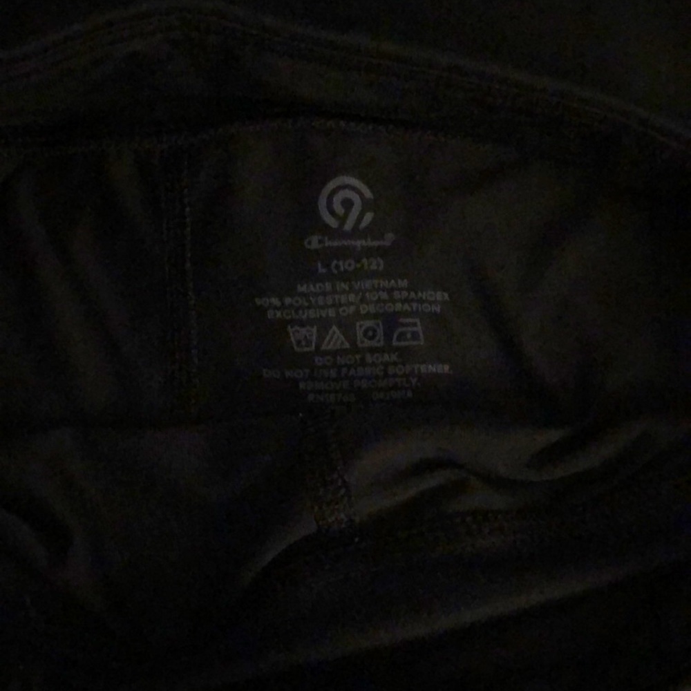 2 pair of girl’s sizeL (10/12) black champion leggings.